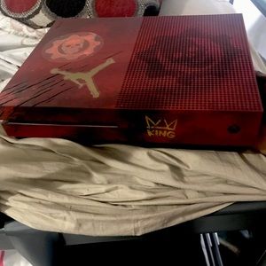 It’s red and black I needed the money for my bills it’s brand new